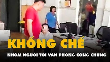 Công an khống chế nhóm người khi tới một văn phòng công chứng tại Bình Dương