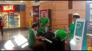 Three Irish fans perform beautiful 'Fields of Athenry' in French train station chords