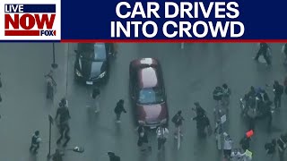 Car speeds through crowd at anti-ICE protest in Chicago | LiveNOW from FOX