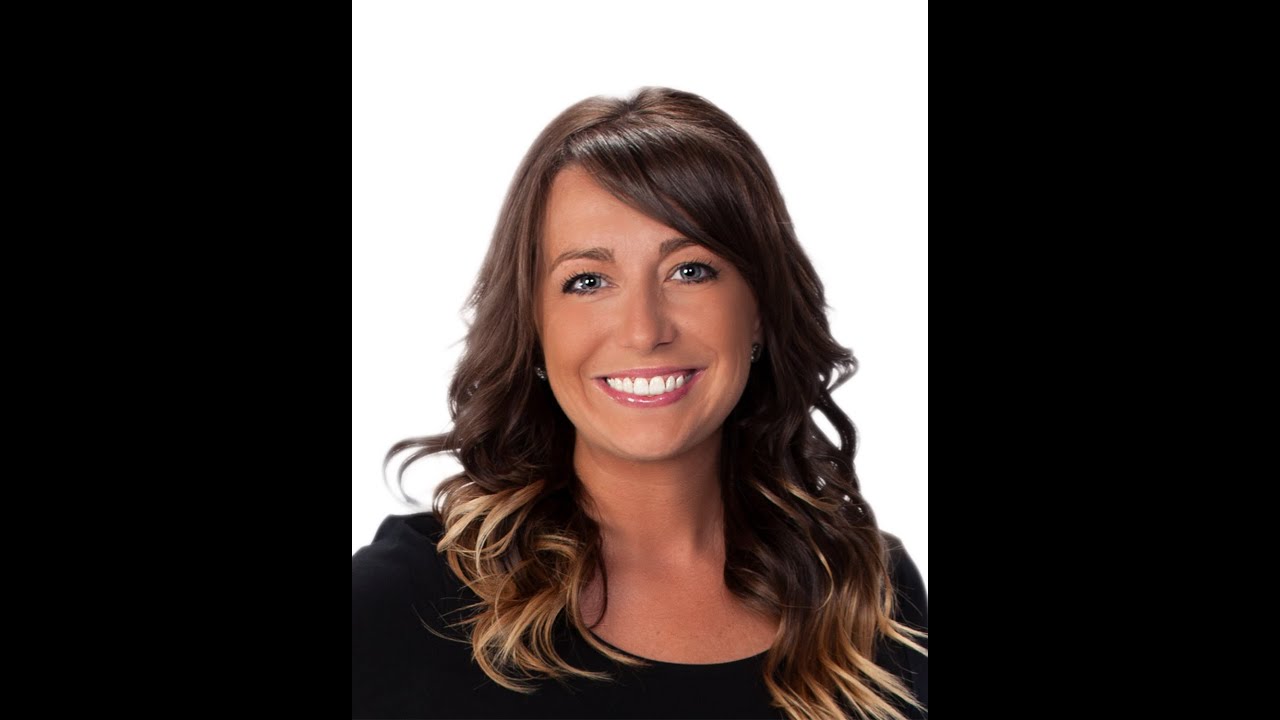 Realtor Kristin Newell with The WoodrowAssociates team HER Realtors