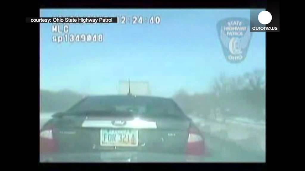 Dashcam near miss: Policeman leaps out the path of speeding truck