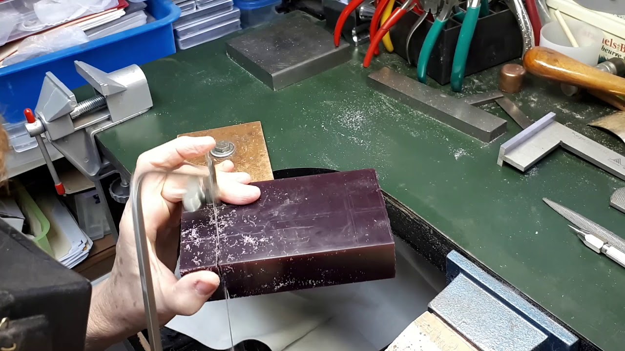 carving a cube in wax