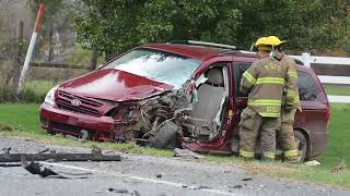 Emergency crews respond to a crash on County Farm Road