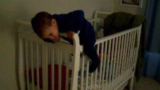 Noah Climbing out of Crib