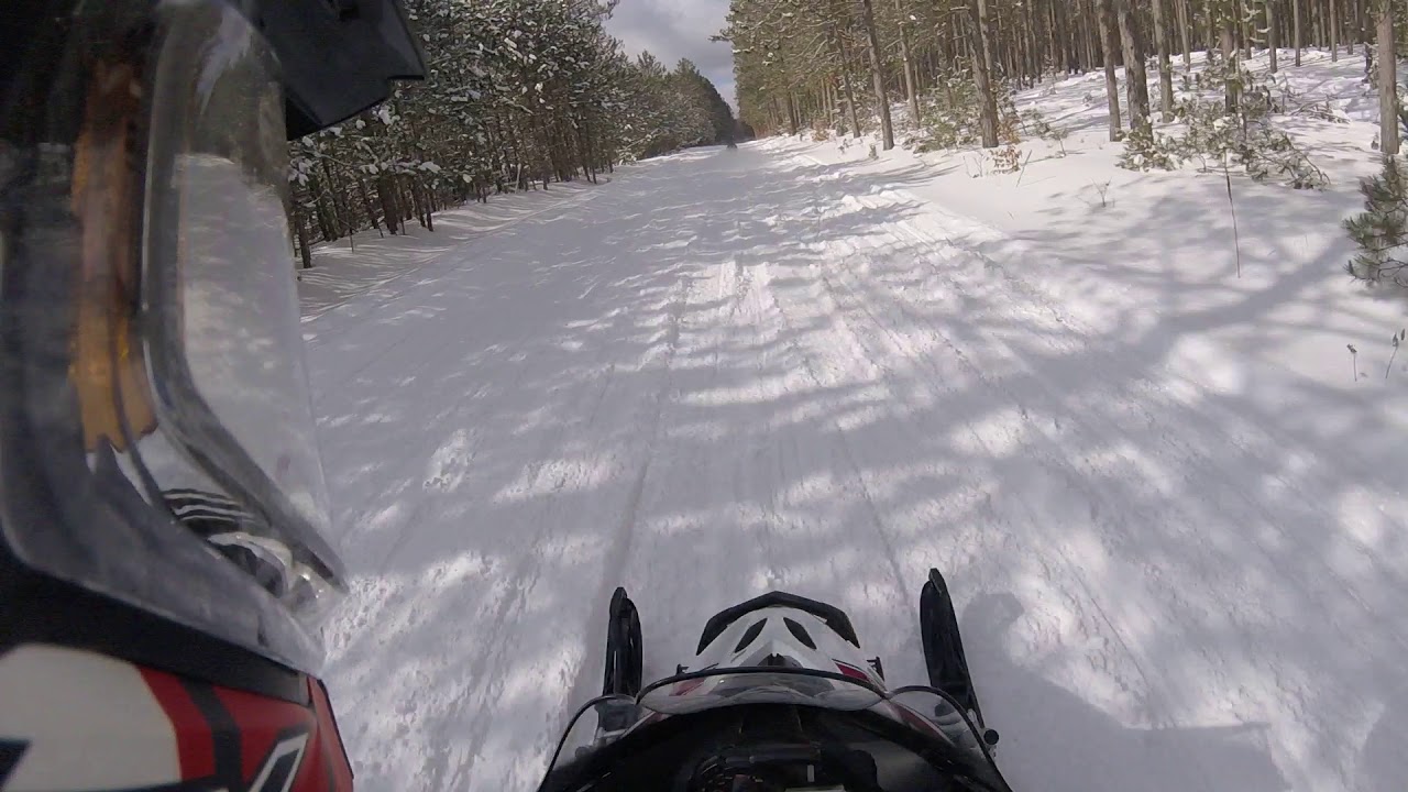 Snowmobiling in Cadillac YouTube