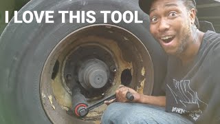 removing lug nuts with the labor saving Wrench,no power tool needed.
