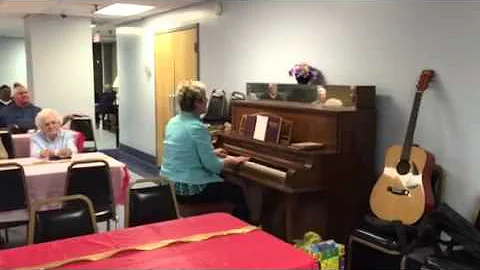 Debbie Rayburn playing at Dunbar Towers