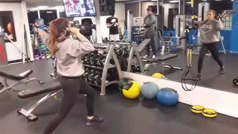 Split Stance single arm dumbbell shoulder press