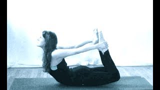 Arching backward gently (Back Extensions)