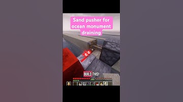 Sand pusher for draining an ocean monument