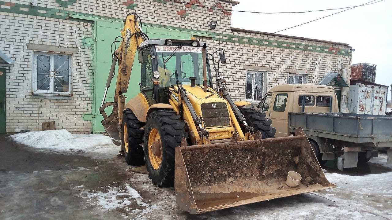 Ремонт КПП экскаватора-погрузчика New-Holland B115. - YouTube