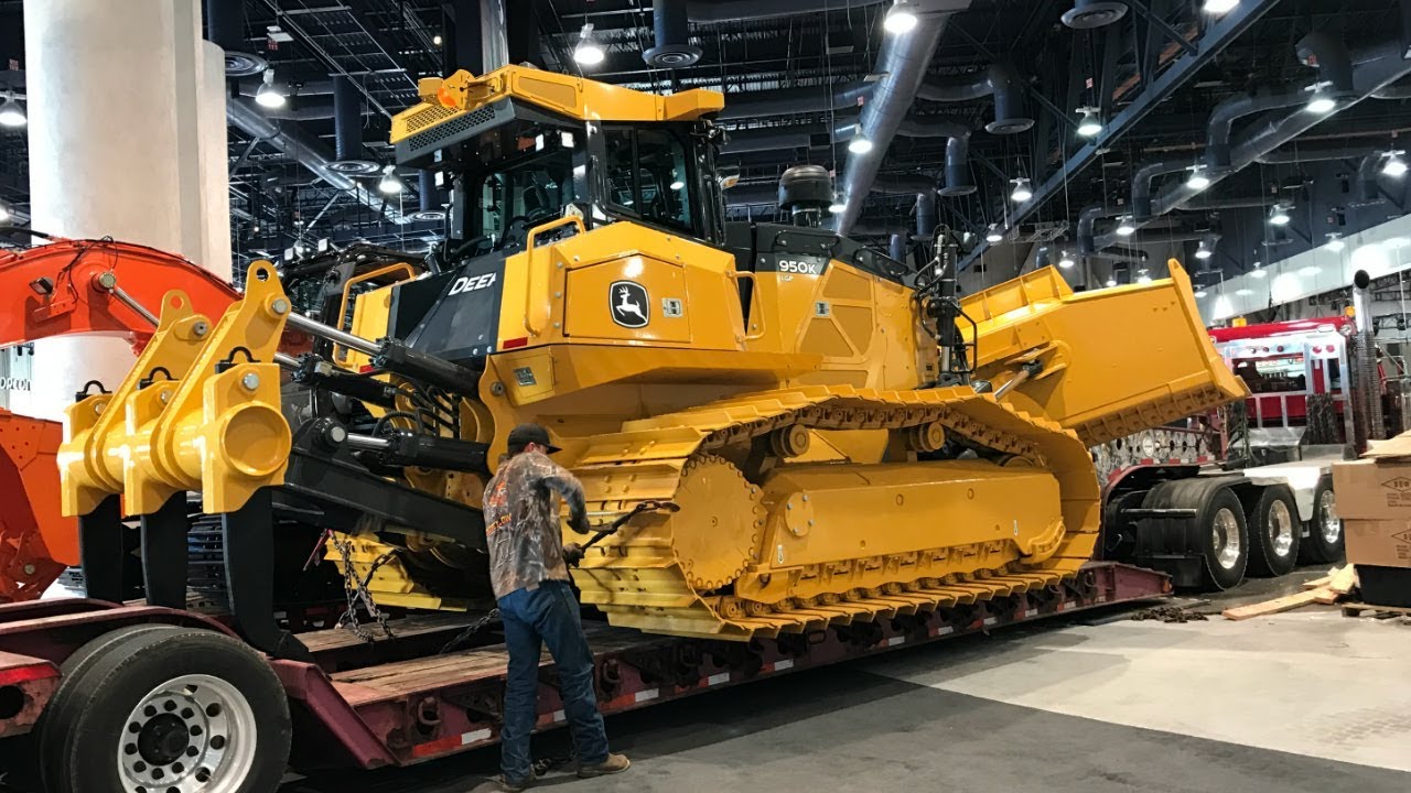 The World's largest bulldozer with a six way blade moving out of Conexpo 2017 - YouTube