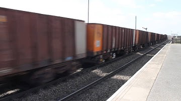 DB class 66015 with a rake of loaded iron ore wagons
