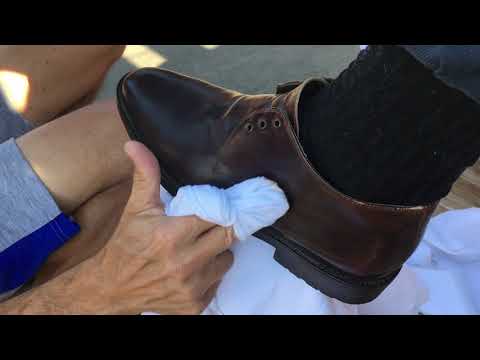 Polishing brown leather boots ...
