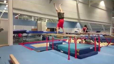Jim van Oostrom - Swing to handstand on parallel bars