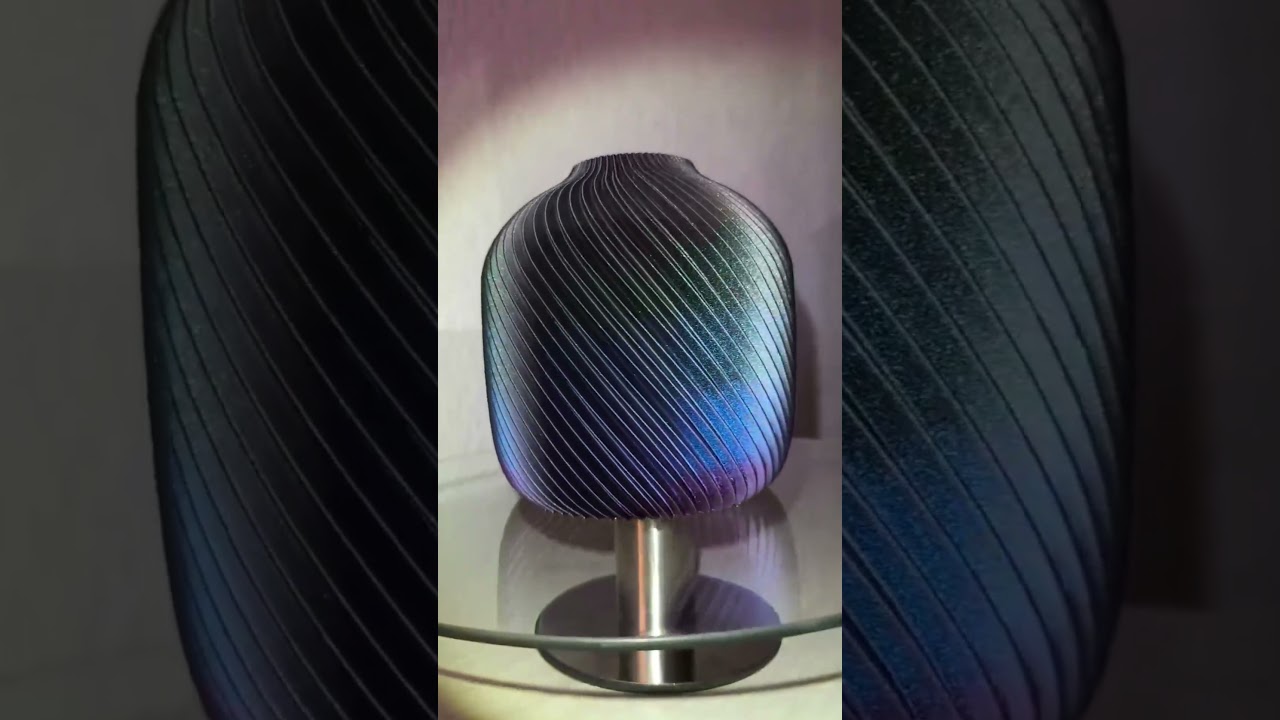 This is a stunning example from Eryone's Burnt Titanium Rainbow filament