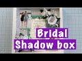 DIY this wedding shadow box with photos and invitation