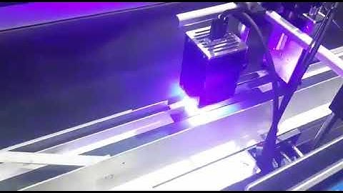 COVID 19 test box coding application with yeacode UV printer at 32.4mm