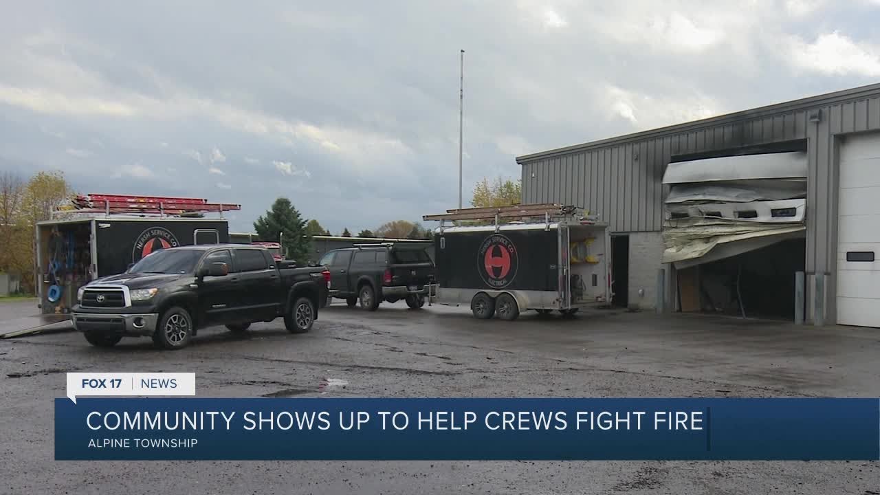 Neighbors Show Up to Fight Alpine Twp Business Fire