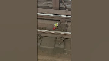 a v8 bottle on nyc subway tracks