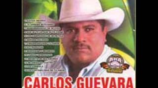 Video thumbnail of "Prisionero de tus Besos - Carlos Guevara"