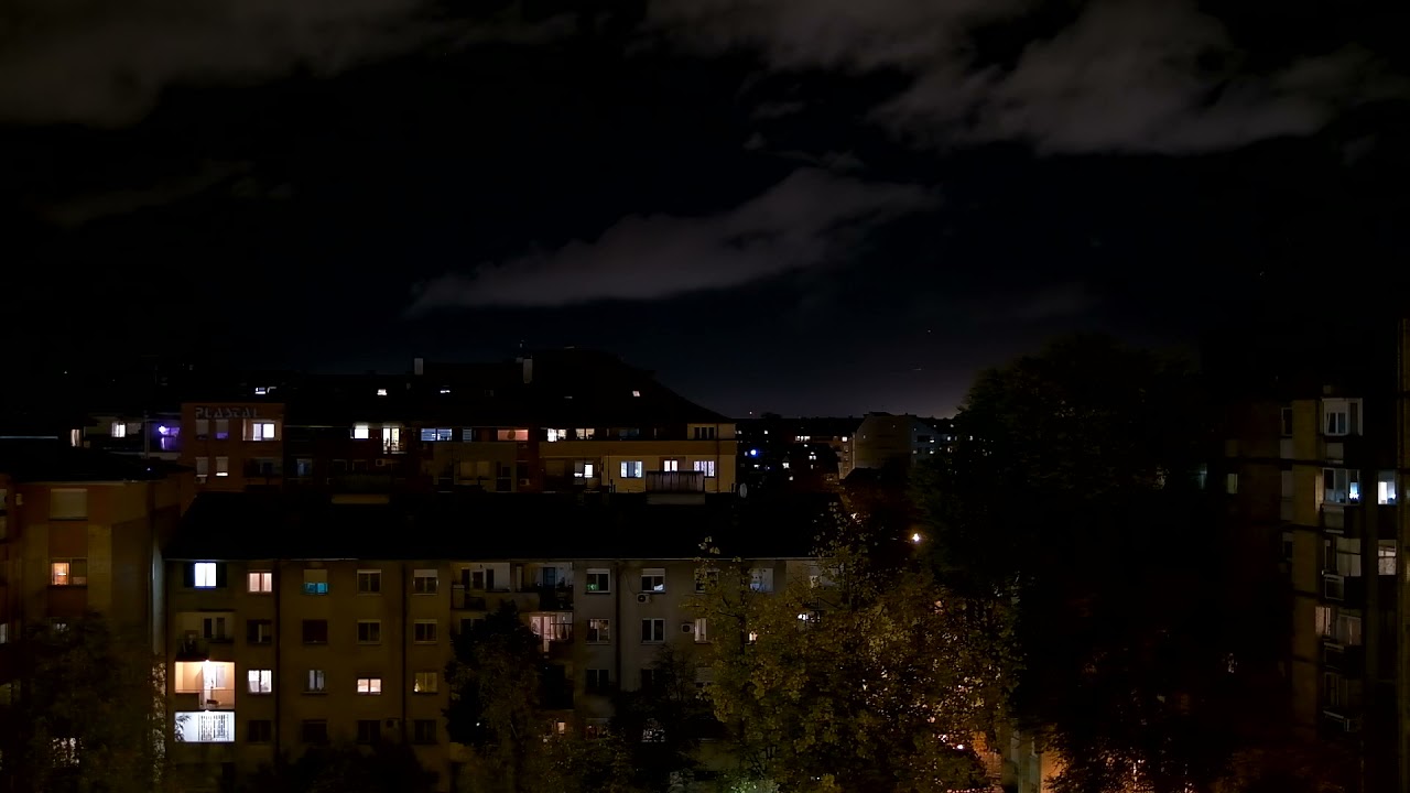 Night Clouds Over Multi Story Buildings Video Free Mp4 Download | OrangeHD
