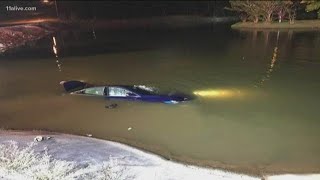 Henry County fire crews rescue man from car in pond
