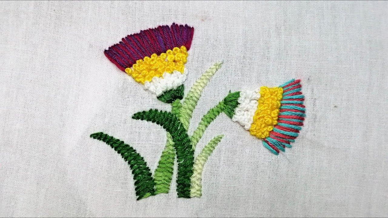 A awesome combination of "French Knot" and "Herring bone" stitch Hand