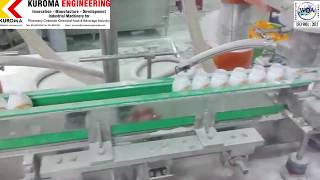 KUROMA ENGINEERING - FILLING AUGER & ROTARY CAPPER MACHINE