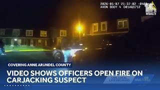 Video shows officers open fire on carjacking suspect