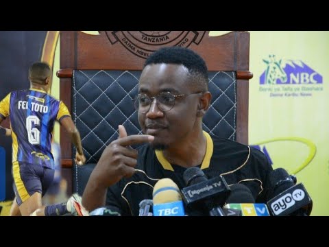 SIKILIZA ALLY KAMWE AJIBU SWALI LA FEI TOTO KUTUA YANGA ,ATHIBITISHA USAJILI BADO 