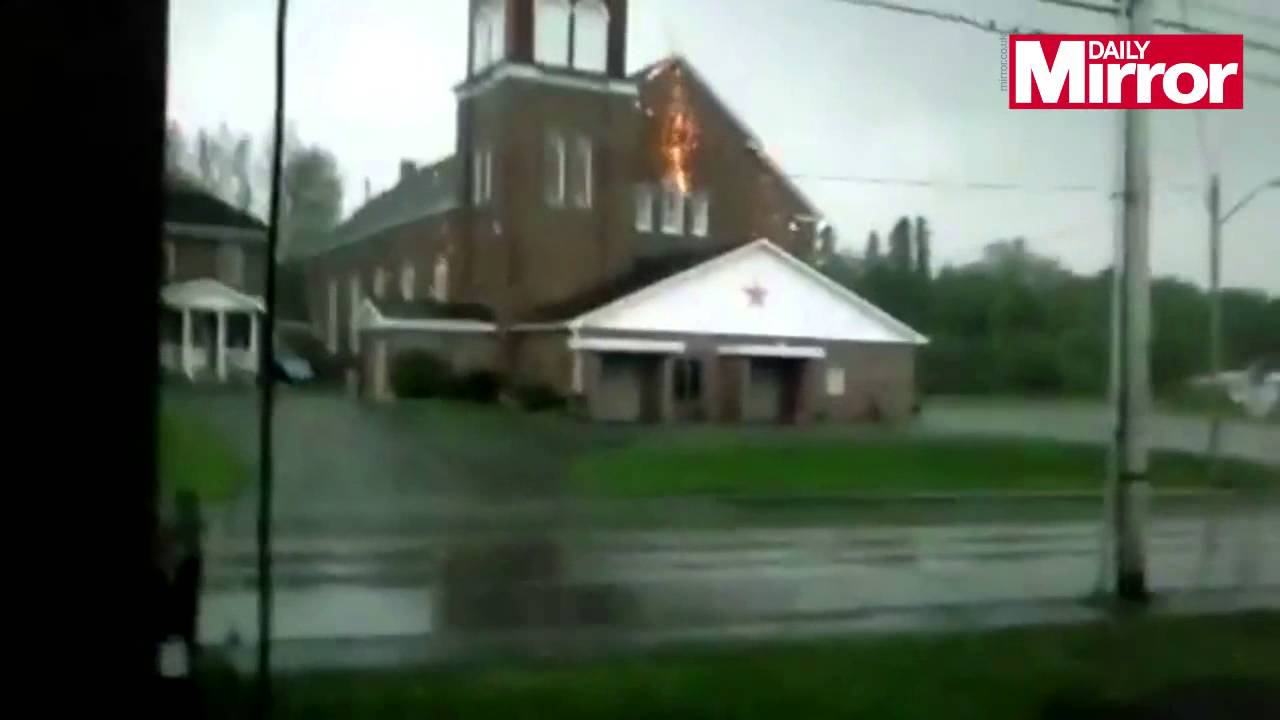 Watch dramatic moment huge bolt of lightning hits church spire sending