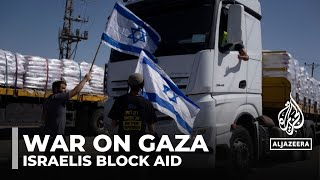 Israeli protesters block aid trucks to Gaza, citing concerns over support for Hamas