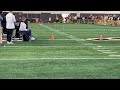 Linebacker Easton Gibbs runs the 40-yard dash at UW's NFL Pro Day on Tuesday at the Indoor Practice