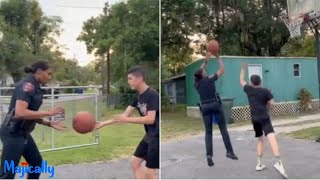 Female police officer schools local teen in game of one on one basketball
