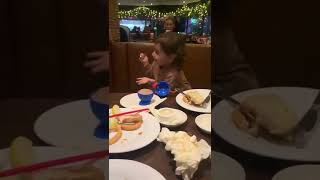 Sofia dancing again at dinner her happy ice cream jig