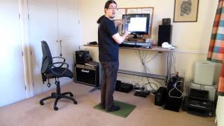 Jake Birkett demonstrating a motorised standing desk