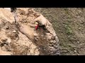 Amazing action of dropping huge rocks from high cliffs