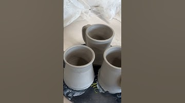 Adding handles to my mugs! #artist #art #viral #ceramics #pottery #wheelthrown #clay #fypシ #shorts