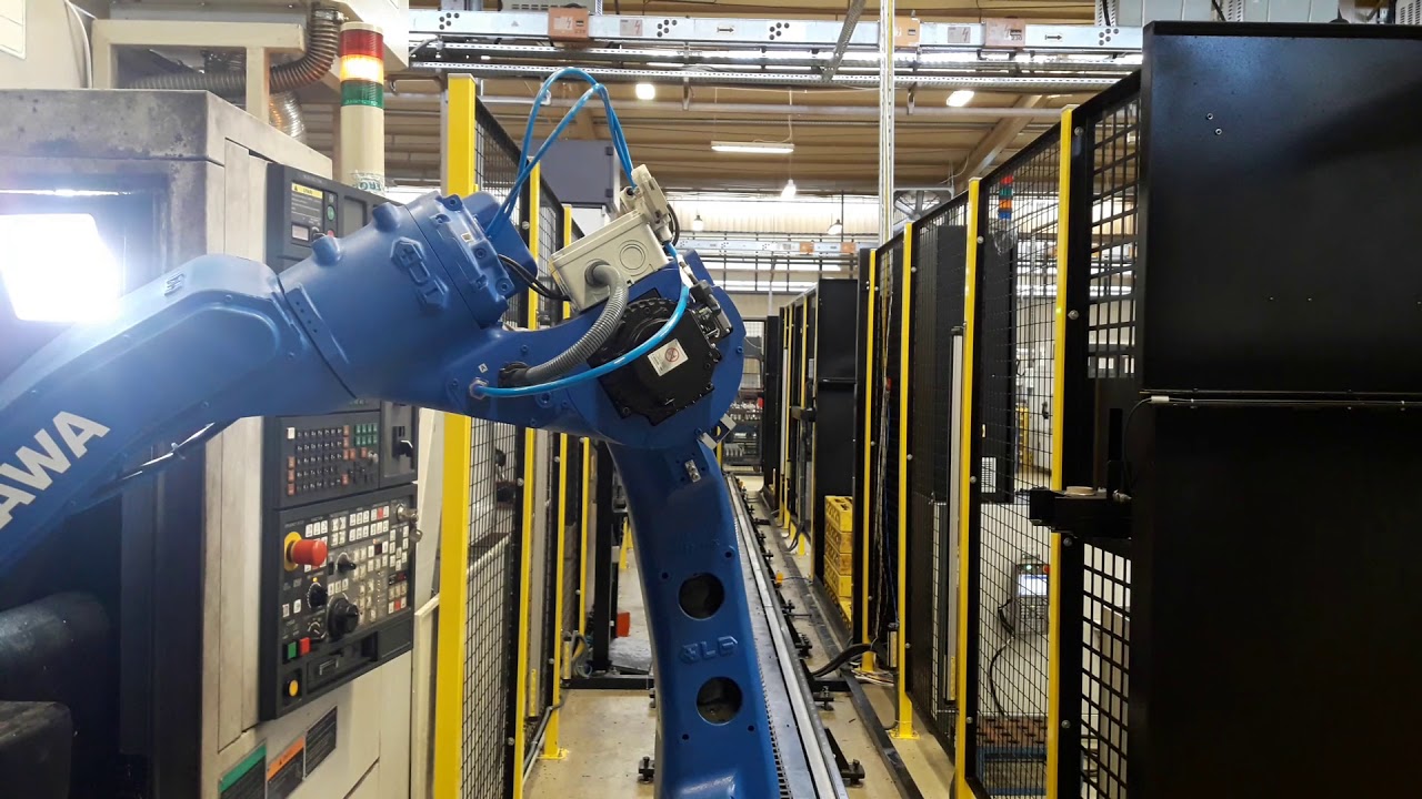 Machine Tending 3 cnc type machines with one robot - YouTube