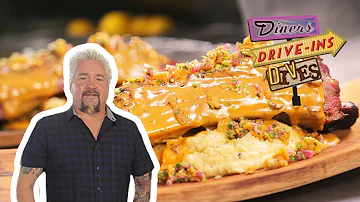 Guy Fieri Eats El Borracho Beef Rib | Diners, Drive-Ins and Dives | Food Network