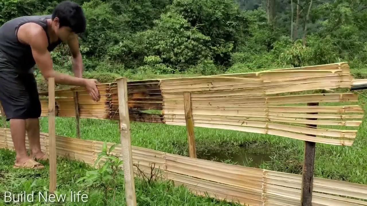 A calf, a goat and a pig help a Vietnamese man transport firewood to the grocery store.