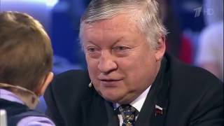 3 years old boy plays chess with Former World Champion A Karpov