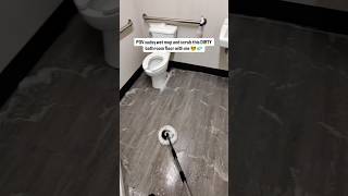 Dirty bathroom floor wet mop and scrub