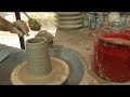 Wetting Clay on the Potter&#39;s Wheel