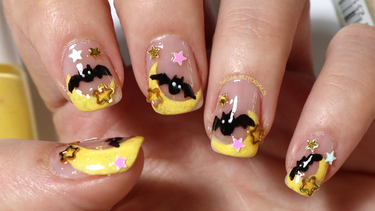 8. "Spooky Bat and Moon Nail Design for Halloween" - wide 4