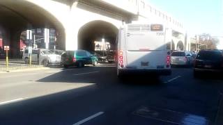 2015 New Flyer XD40 #7390 on Q32 Departs 46th Street Bus Stop