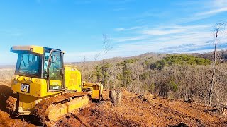 CAT D5 CLEARING STEEP LAND FOR SEPTIC TANK SYSTEM…