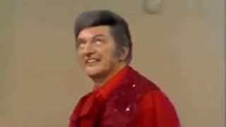Have fun with Liberace: Lee has to do some &quot;work&quot; with his piano (1971)