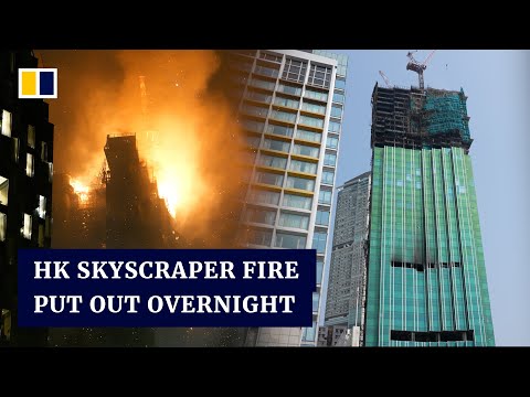 Hong Kong firefighters battle skyscraper blaze all night, investigation under way